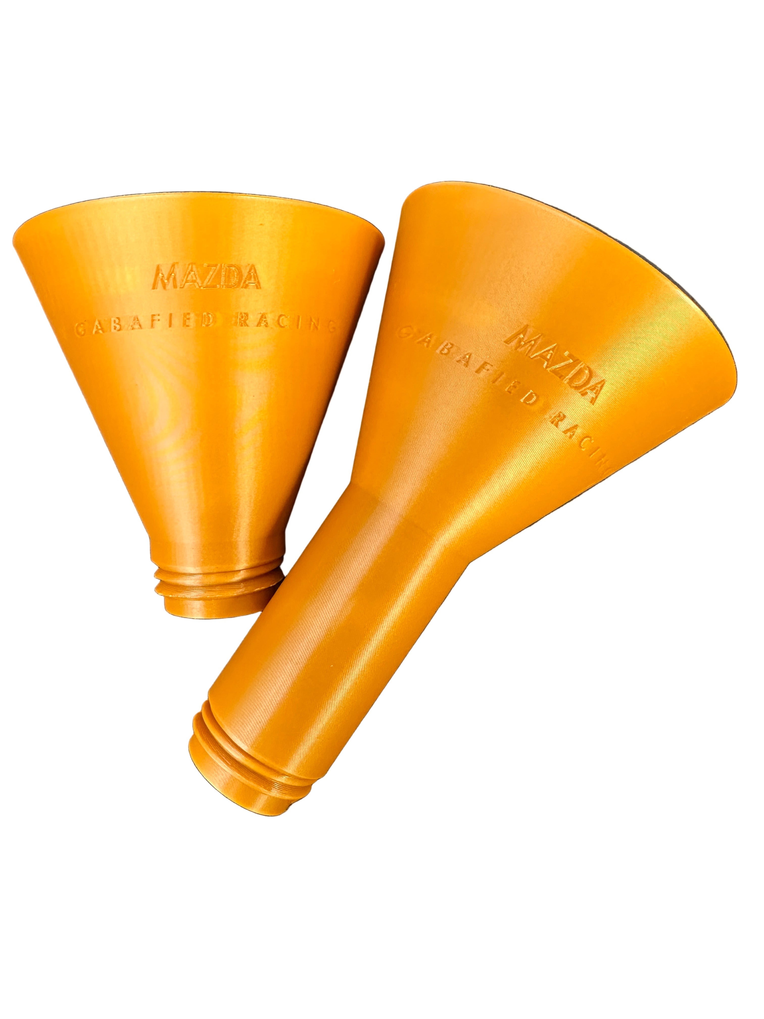 Two gold funnels on a white background